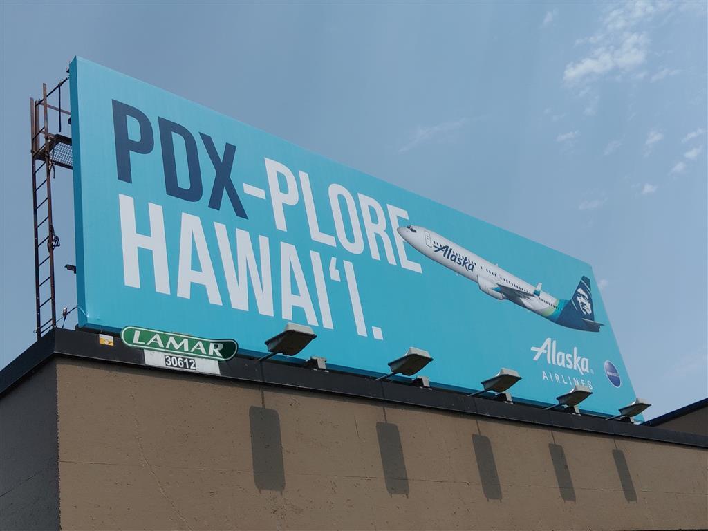 billboard advertisement for Alaska airlines